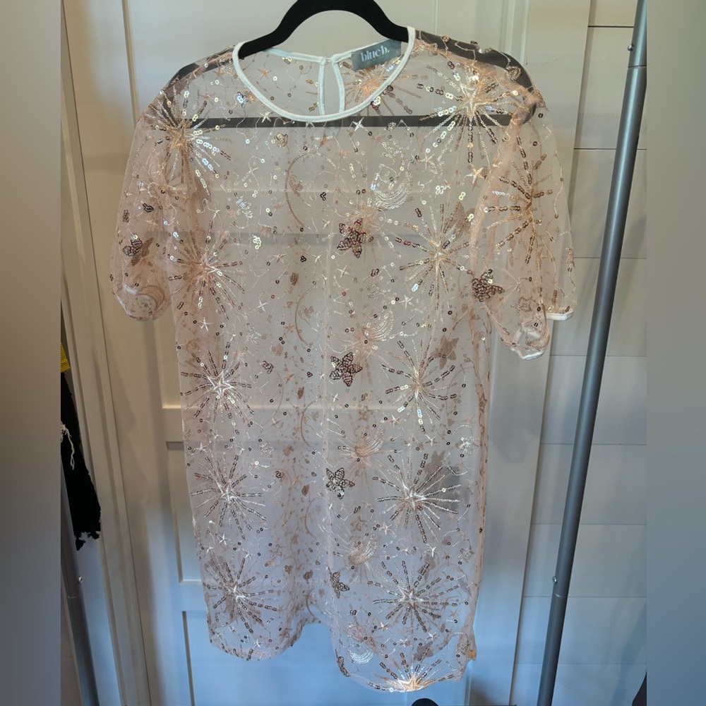 Sparkly dress. Super cute over a slip